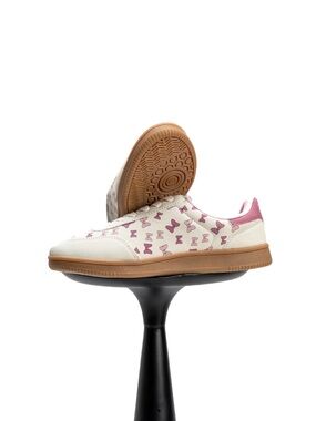 Disney Minnie Mouse Bow detail.  Pink Athletic Sneakers with Bow Print